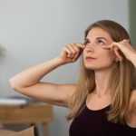side-view-woman-practicing-facial-yoga